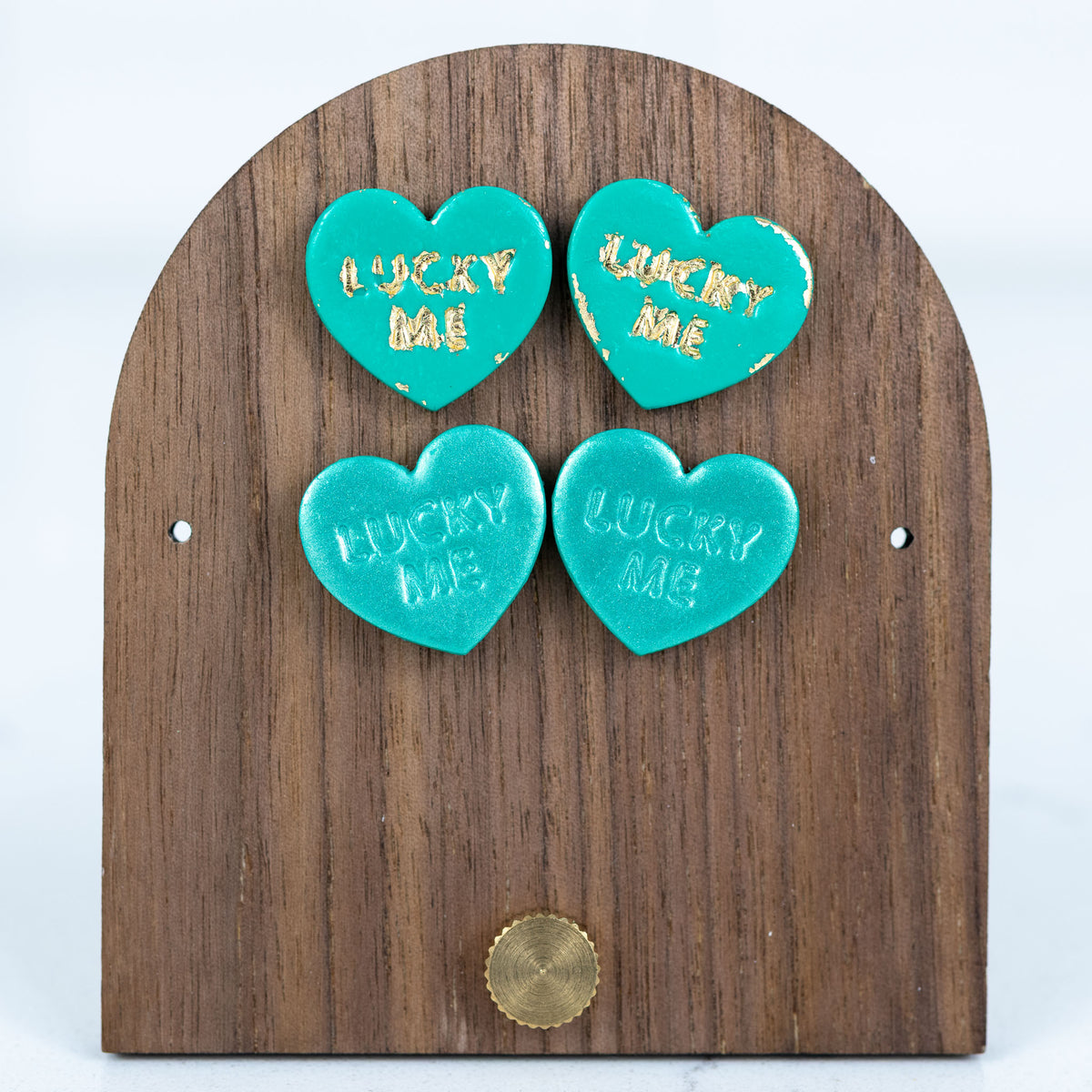 Green lucky me heart polymer clay stud earrings with gold lettering detail