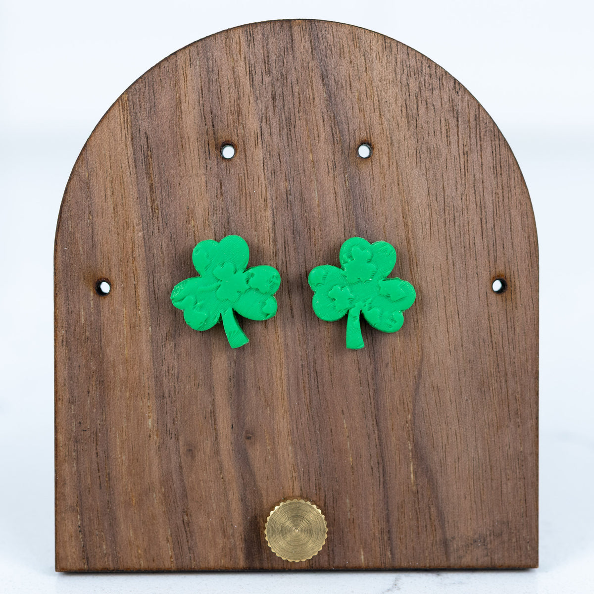 Small textured shamrock stud earrings in green polymer clay