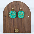 Teal shamrock statement earrings with gold accent detail and gold ball studs